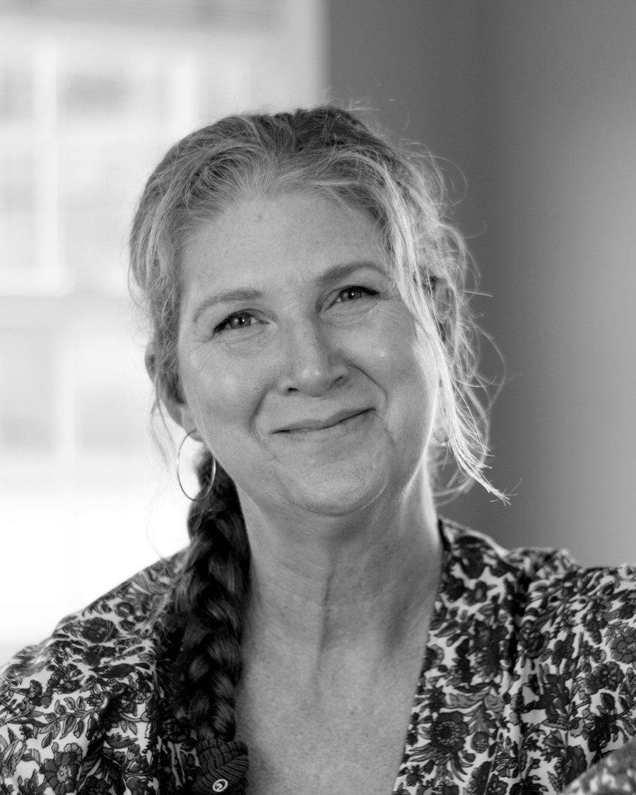 Portrait of Susan Simon, co-founder of JourneyŌM, in black and white